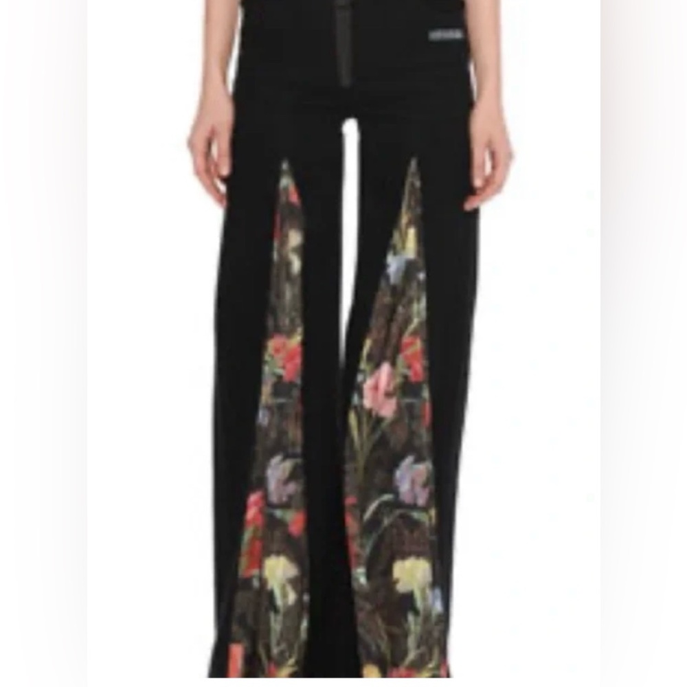 Off-White black flare denim wide leg pants featuring floral side panels. Size 31